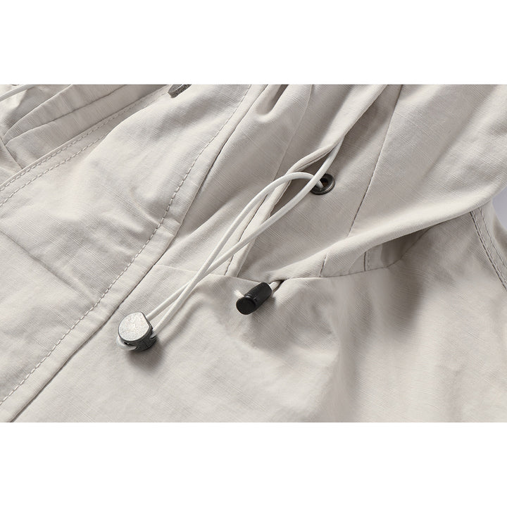 Unisex Light windproof hooded jacket in boxy cut with drawstring and concealed front Mune Fashion