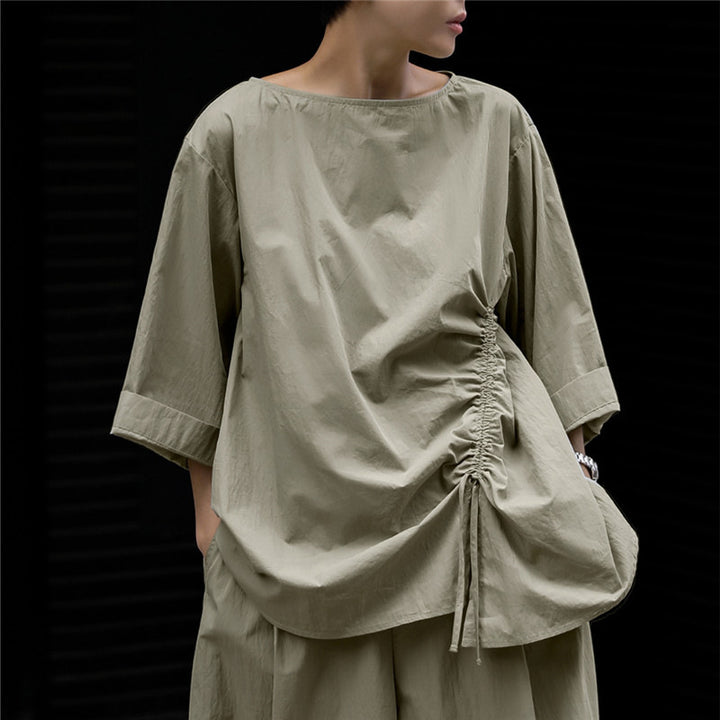 Women's oversized blouse with side cord gathering, bateau neckline, and wide sleeves Mune Fashion