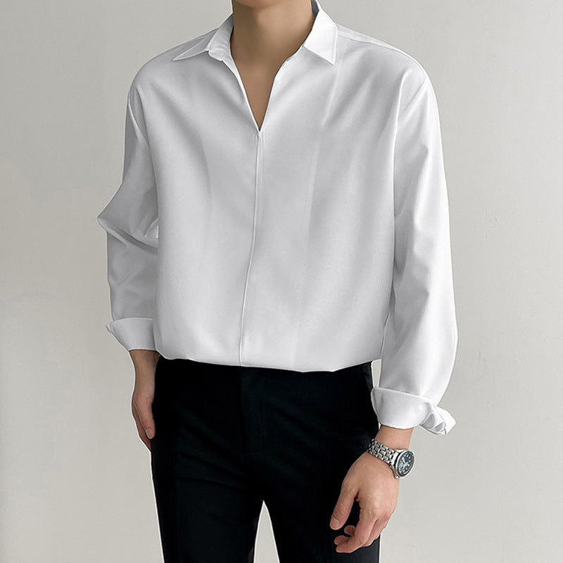 Women's loosely cut tunic blouse with deep V-neck, concealed button placket, and dropped shoulders Mune Fashion