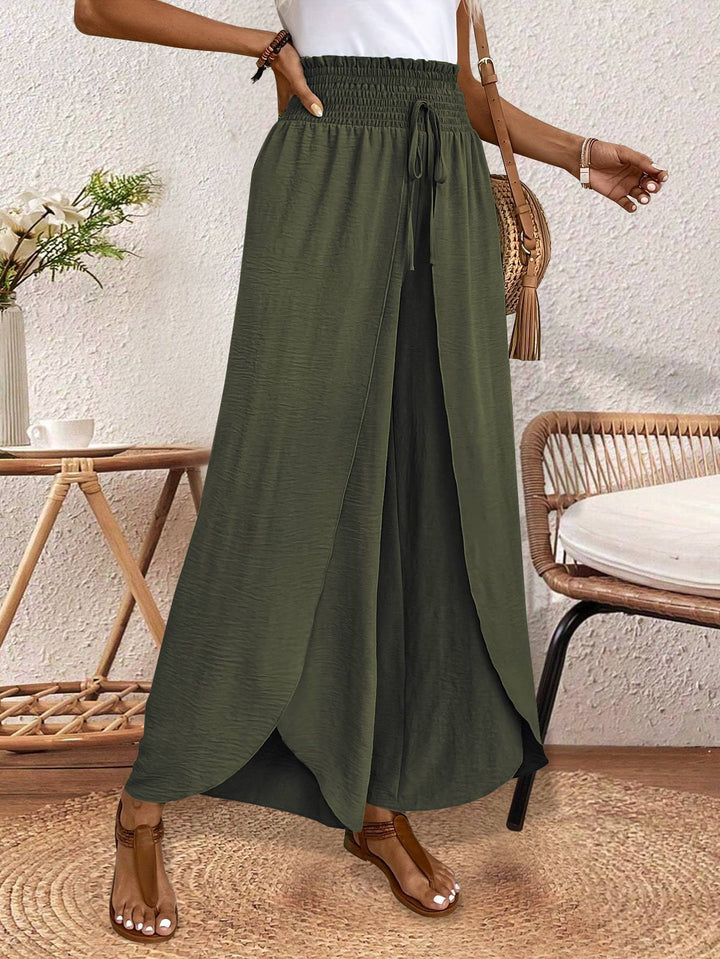 Ladies nan wrap maxi skirt with high smocked waistband and integrated palazzo pants lining Mune Fashion