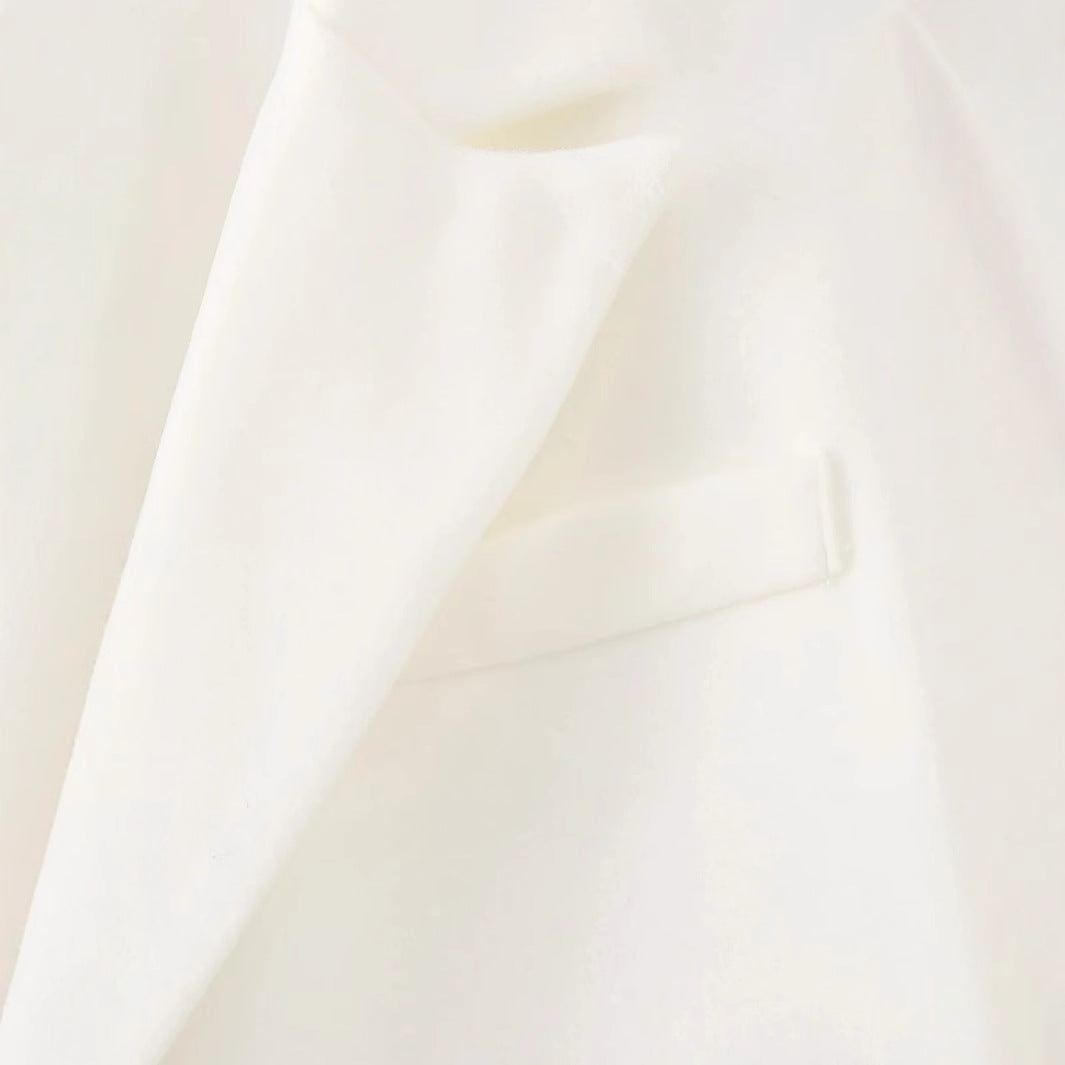 Women long fringed blazer coat with pleated hem, lapel collar and patch pockets Mune Fashion