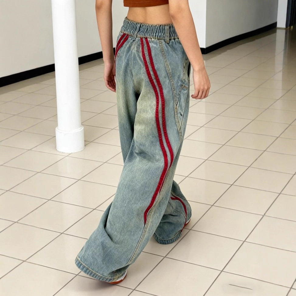 Women's low-rise extra-wide baggy jeans made of vintage denim with side tape stripes Mune Fashion