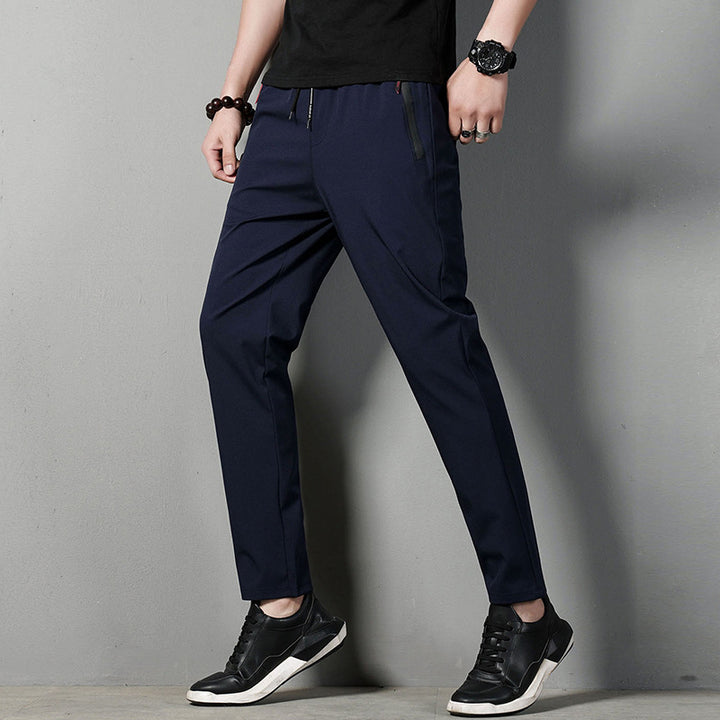 Men's narrow-fitting tech chino joggers with elastic drawstring waistband, concealed zip pockets, and pre-shaped knees Mune Fashion