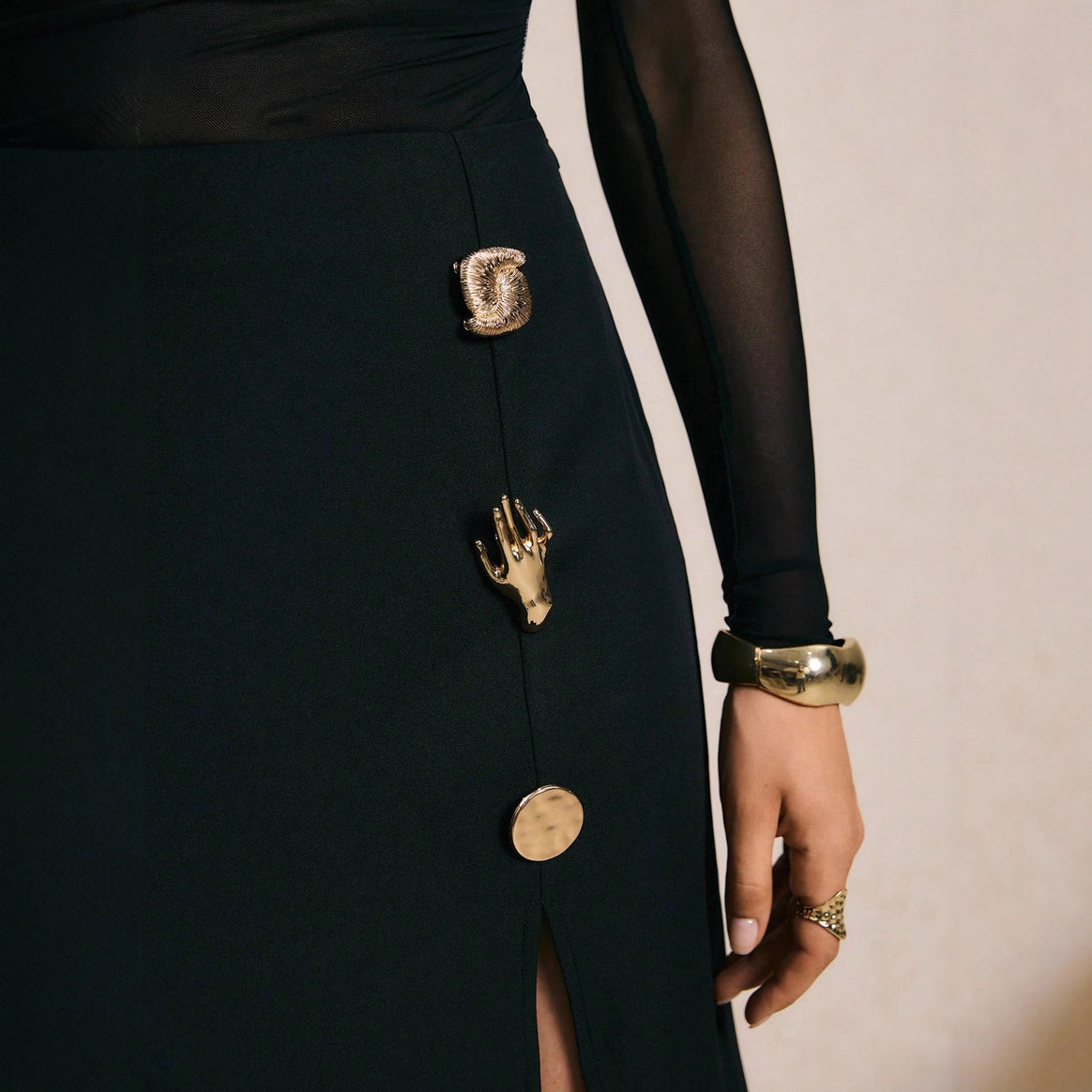 Women fitted midi skirt with front slit and decorative metal buttons Mune Fashion