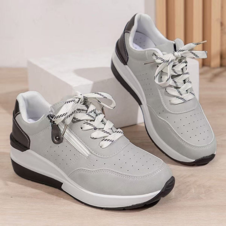 Women's wedge sneakers with side zipper and perforated upper material Mune Fashion