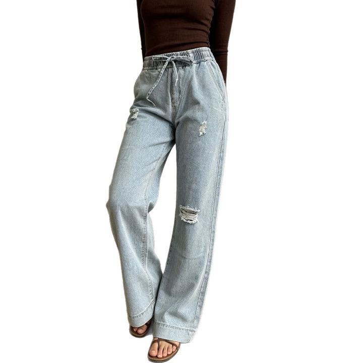 Women's wide denim pants with elastic drawstring waistband, used effects and relaxed fit Mune Fashion