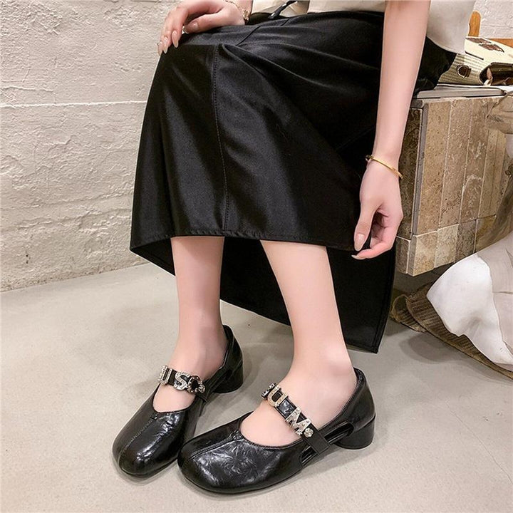 Women's Mary Jane ballet flats with decorative strap, rounded toe area and low block heel Mune Fashion