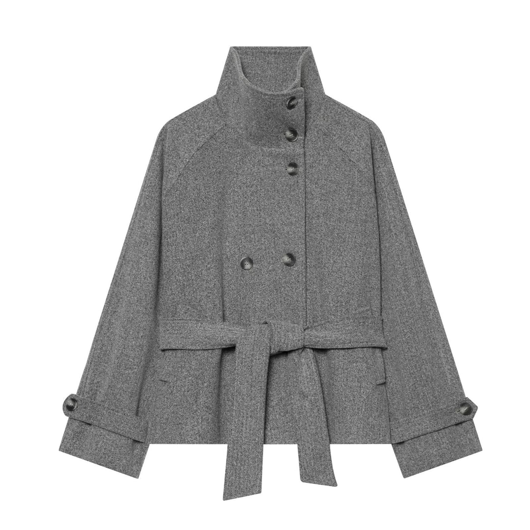 Women's cape transitional jacket in a short cut with a high collar, double button placket, and waist tie belt Mune Fashion