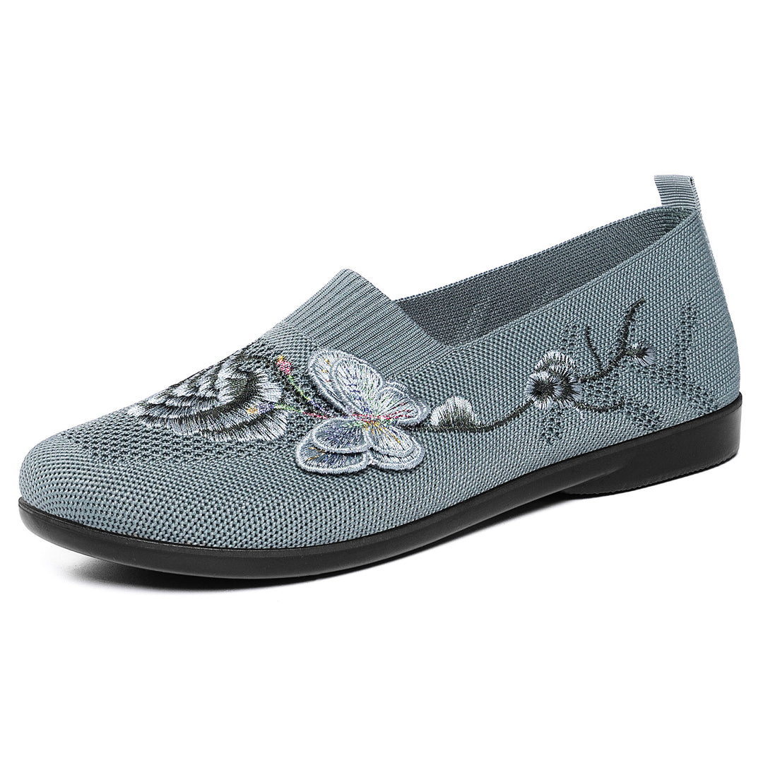 Women's embroidered knitted slipper with sock-like entry, floral embroidery design, and cushioned lightweight sole Mune Fashion