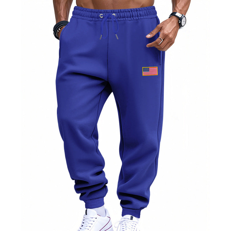 Men's slim-fit sweatpants with tapered leg, elastic drawstring waistband, and discreet flag application Mune Fashion