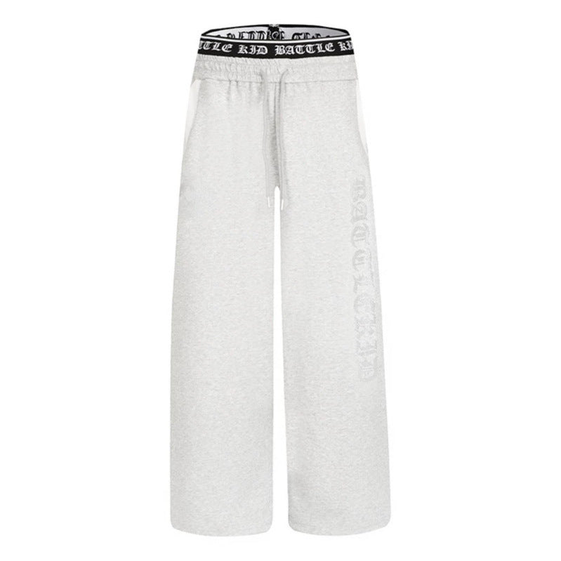 Women's wide lounge jogging pants with high logo waistband, gothic print and drawstring Mune Fashion
