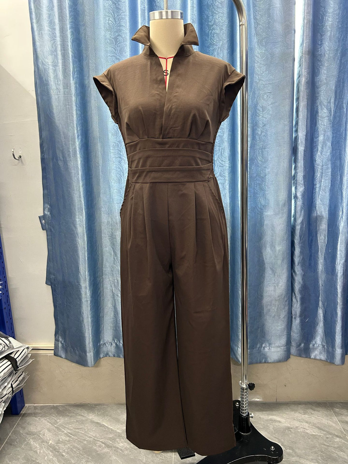 Women's jumpsuit with wide leg, tailored wrap waistband and standing collar Mune Fashion