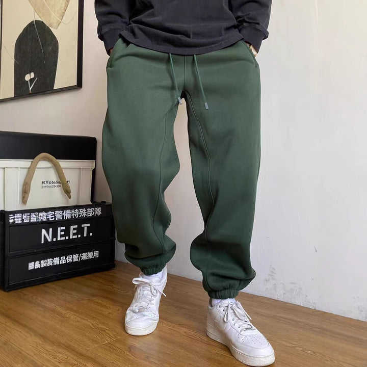 Men's nan tapered jogging pants with distinctive seam, drawstring, and elastic ankle cuffs Mune Fashion