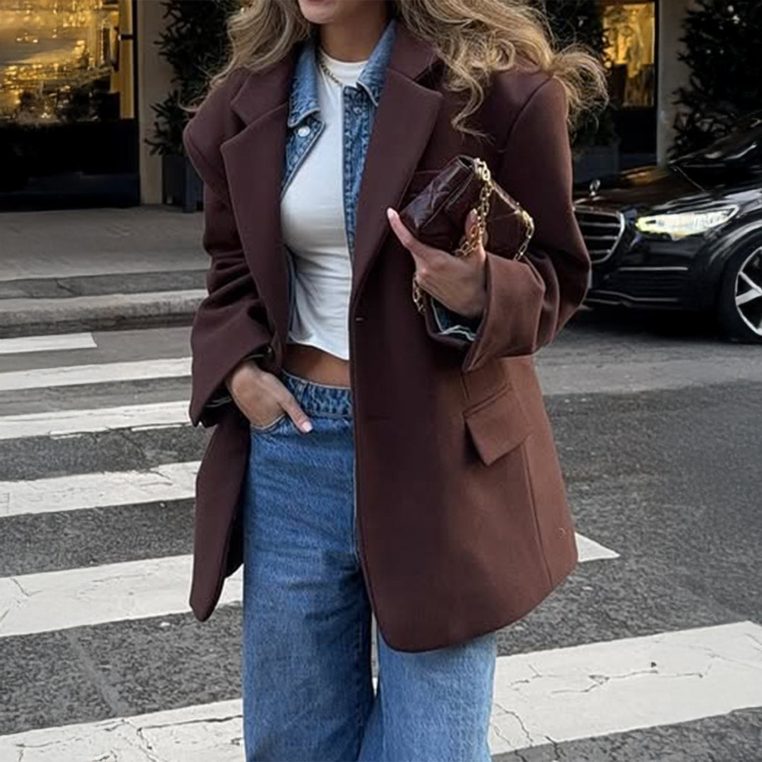 Women's oversized long blazer with boxy cut, notched lapel, padded flap pockets, and textured wool blend Mune Fashion