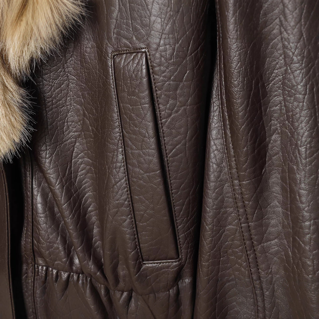 Women's short-cut bomber jacket made of leather look with voluminous faux fur collar Mune Fashion