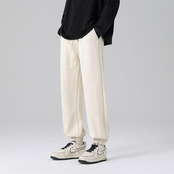 Men's joggers in a relaxed fit with a crease, drawstring, and elastic cuffs Mune Fashion