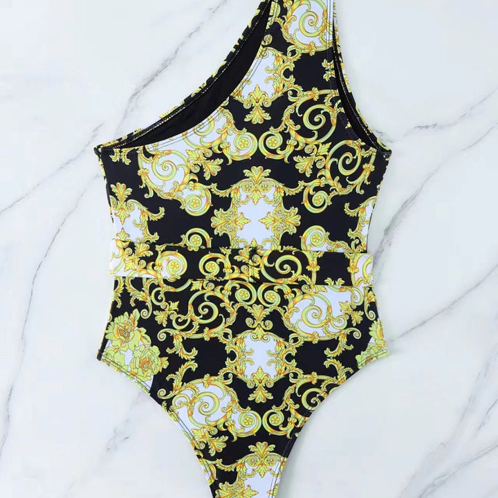 Ladies' one-piece swimsuit with asymmetrical cut and elegant belt Mune Fashion