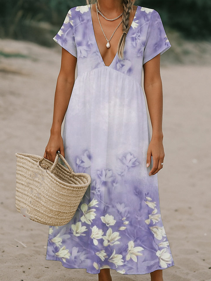 Ladies max dress with deep V-neck and flowing skirt Mune Fashion