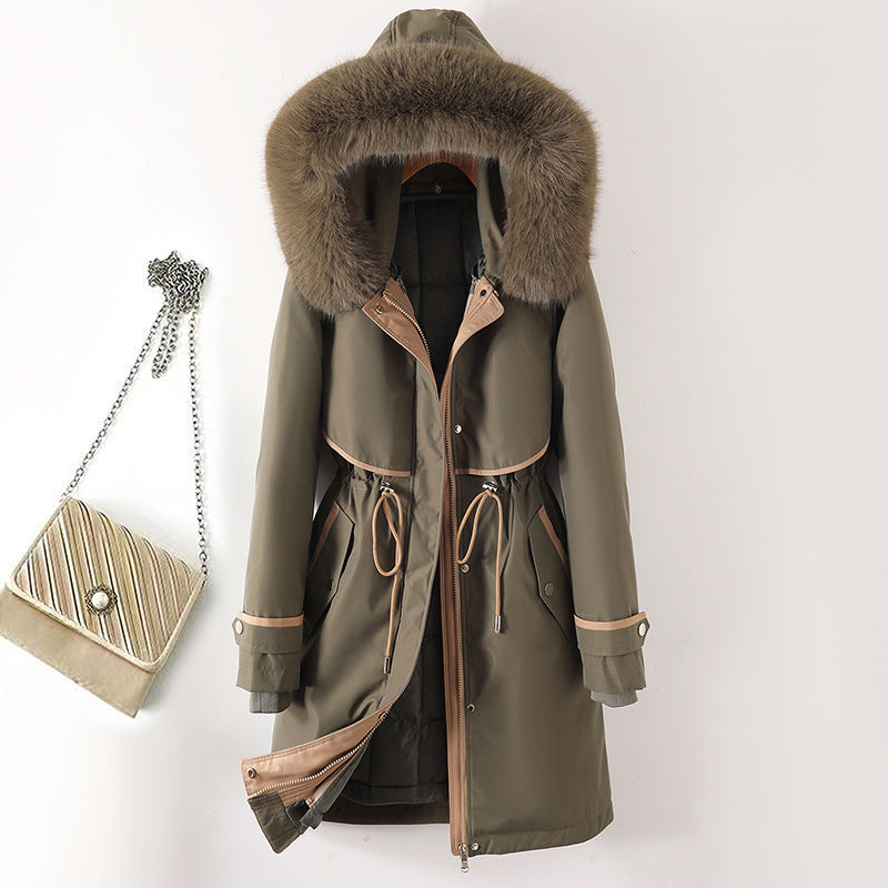 Women's long parka with faux fur hood, waist drawstring, and contrasting piping Mune Fashion