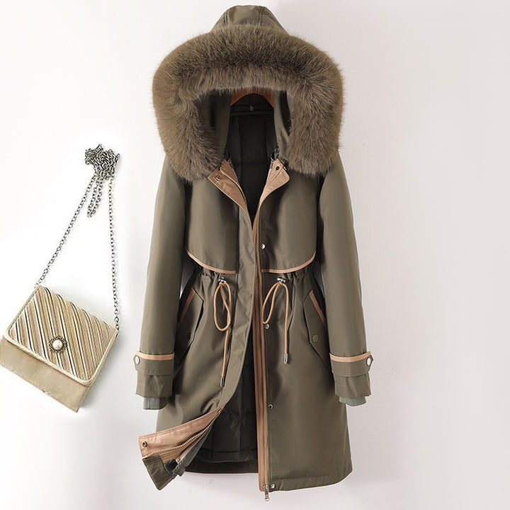 Women's long parka with faux fur hood, waist drawstring, and contrasting piping Mune Fashion