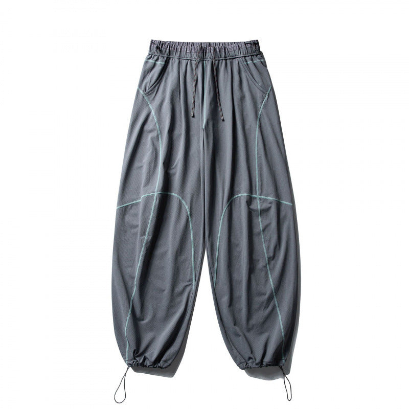 Unisex locker cut tech jogging pants with elastic waistband, distinctive flatlock seams and drawstring Mune Fashion