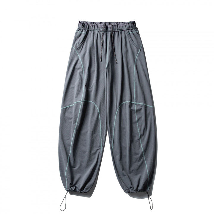 Unisex locker cut tech jogging pants with elastic waistband, distinctive flatlock seams and drawstring Mune Fashion