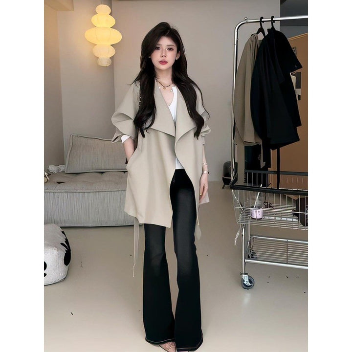 Women's short coat with wide cut stand-up collar and waist belt Mune Fashion