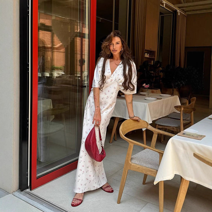 Women’s maxi dress made of satin with wrap top, V-neck & voluminous puff sleeves Mune Fashion