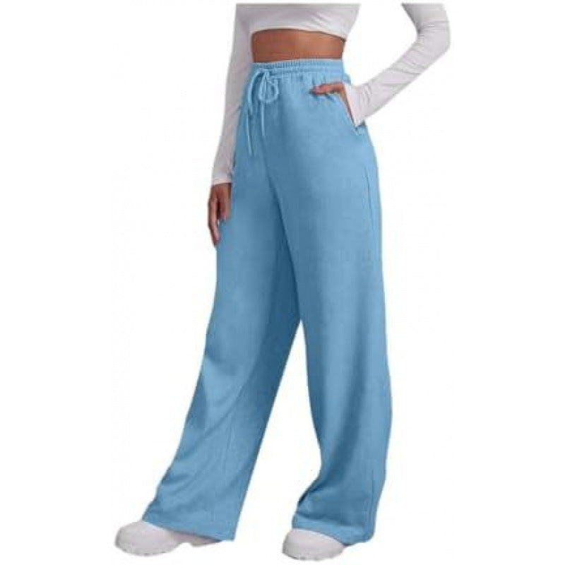 Women's flowing high-waist palazzo lounge pants made of lightweight jersey with elastic waistband and practical side pockets Mune Fashion