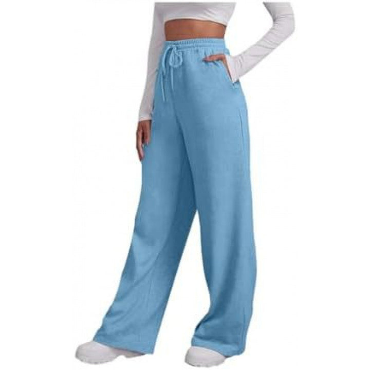 Women's flowing high-waist palazzo lounge pants made of lightweight jersey with elastic waistband and practical side pockets Mune Fashion