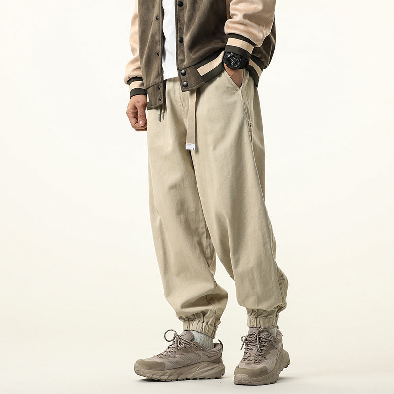 Men's wide relaxed cargo pants in jogger style with elastic tunnel drawstring waistband and cord decoration Drune