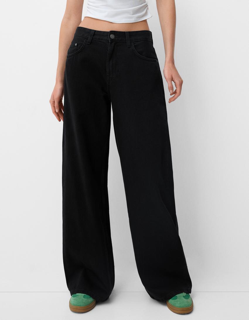 Women's ultra-wide floor-length denim palazzo pants with clean pocket cut and light stretch effect Mune Fashion