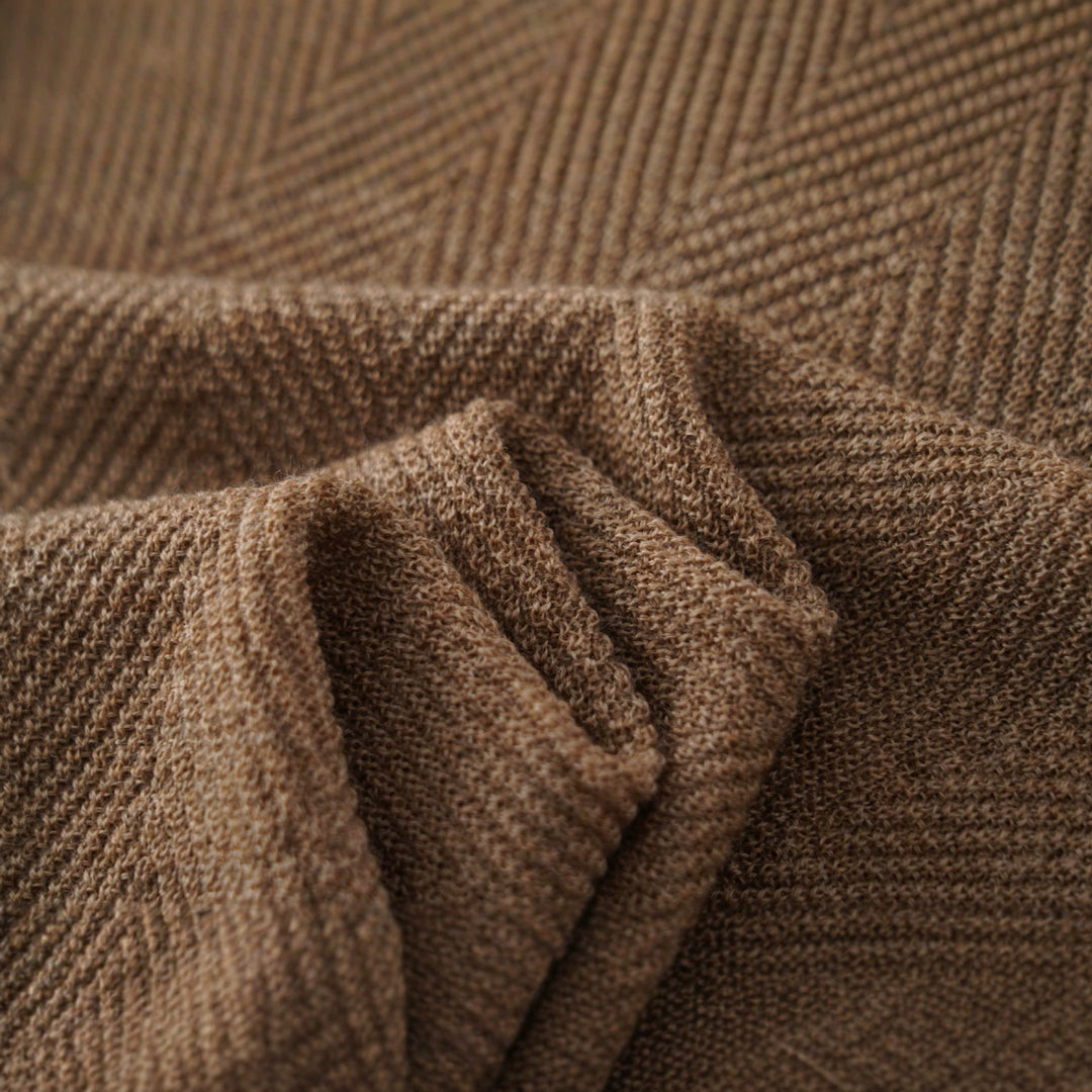Women's fine-knit top with stand-up collar, elbow-length sleeves, and herringbone structure Mune Fashion