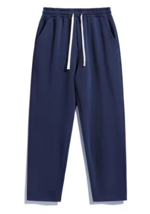 Unisex casual straight-leg joggers with elastic comfort waistband, contrasting drawstring and side pockets Mune Fashion