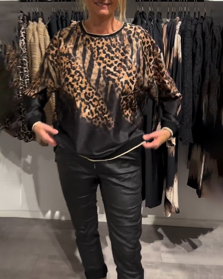 Women's non-silky Oversize blouse with animal pattern, raglan sleeves and elastic hem Mune Fashion