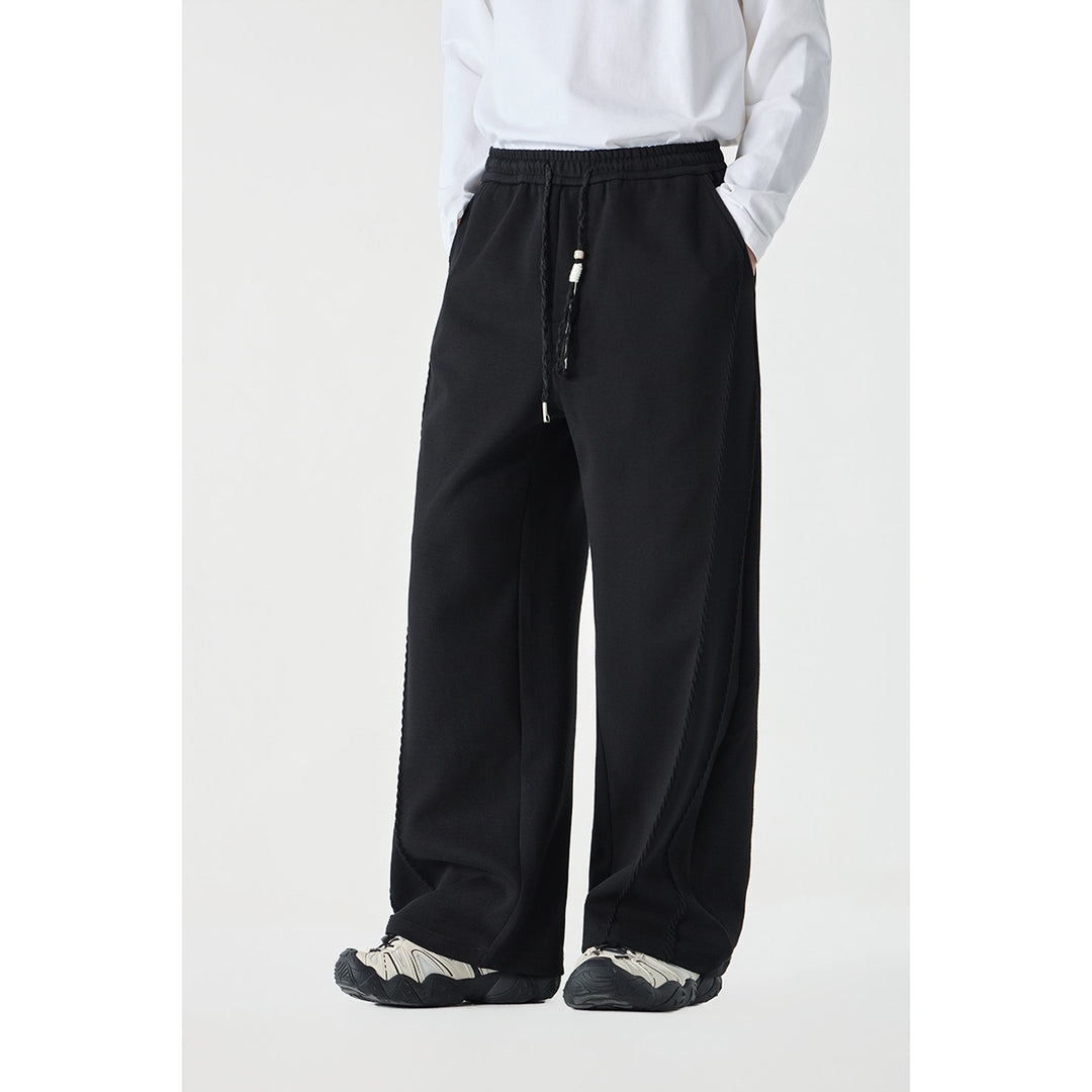 Women's Wide High-Waist Jogging Pants with Decorative Seams and Drawstring Mune Fashion