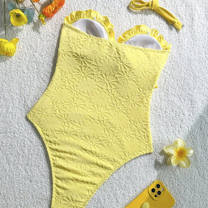 Women's swimsuit with playful ruffle design and trendy knot detail Mune Fashion