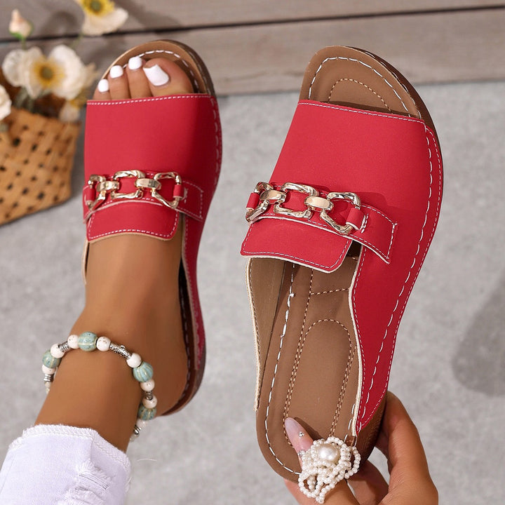 Women's open slide with square toe area, padded comfort footbed and decorative metal chain Mune Fashion