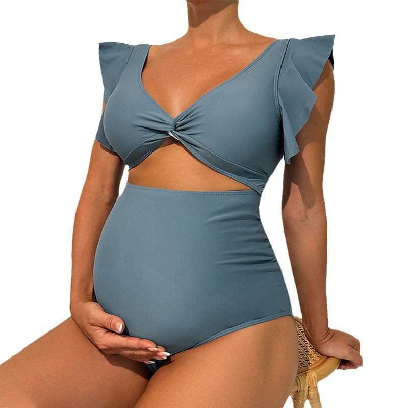 Women's one-piece swimsuit with ruffle details and deep V-neck Mune Fashion