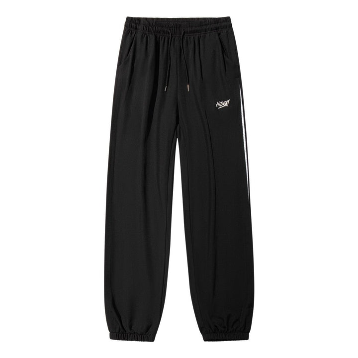 Men's sporty training pants with elastic waistband and side zip pockets Mune Fashion