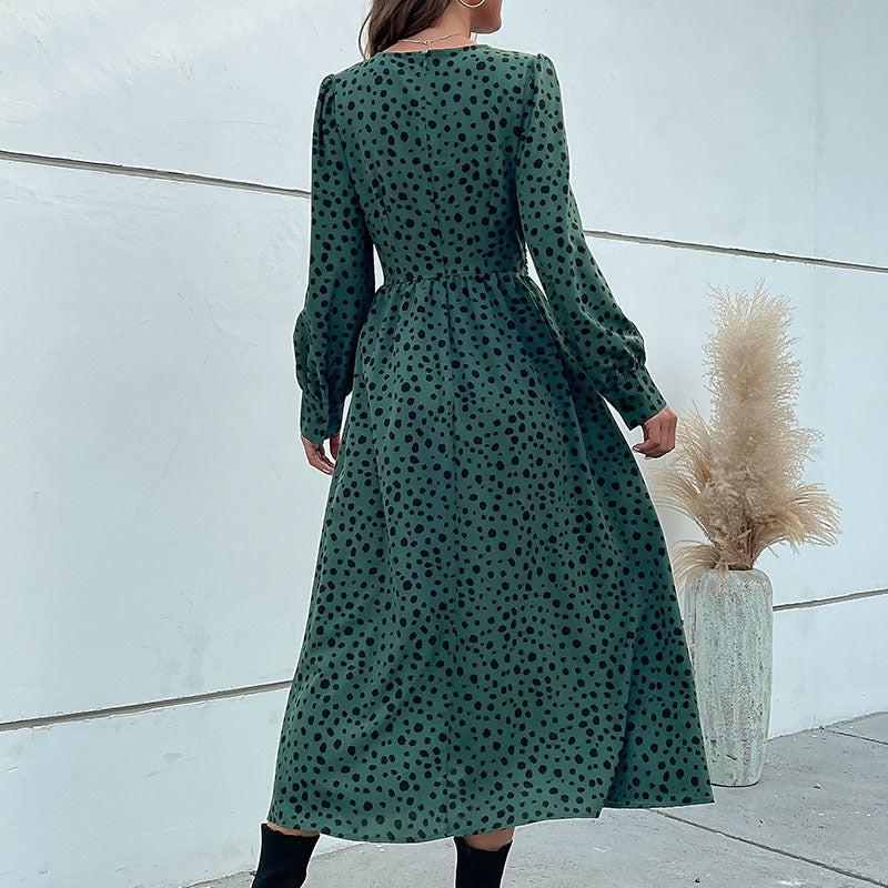 Women's midi dress in retro polka dot design with wrap look, V-neck and tailored tie belt Mune Fashion