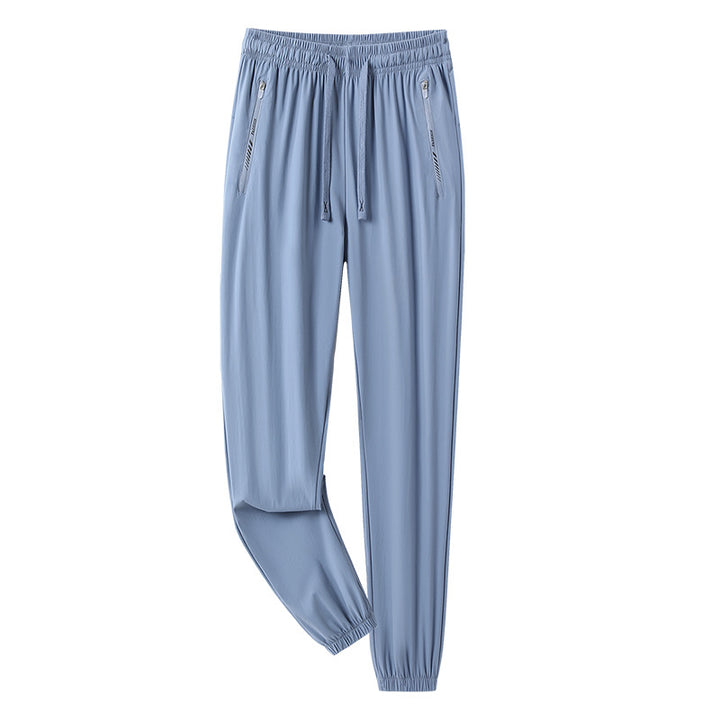 Men's sporty jogging pants with adjustable waistband and zippered pockets Mune Fashion