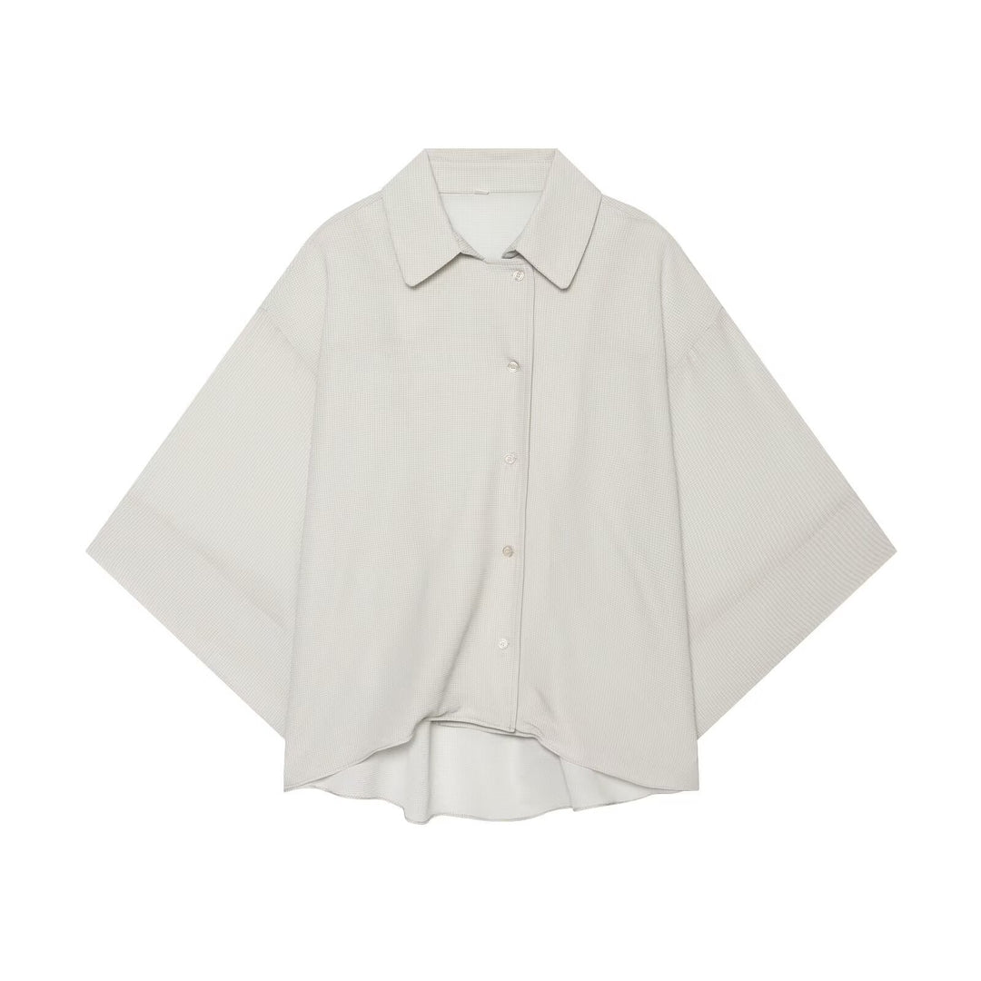 Women's oversized shirt blouse with waffle texture, boxy silhouette, and high-low hem