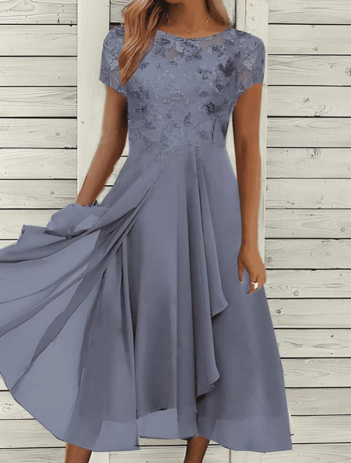 Women's flowing chiffon mid dress with floral embroidered top and asymmetrical tiered skirt Mune Fashion