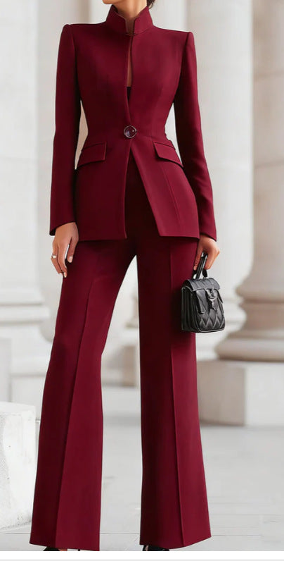 Women tailored suit with stand-up collar, fitted peplum and flared trousers Mune Fashion
