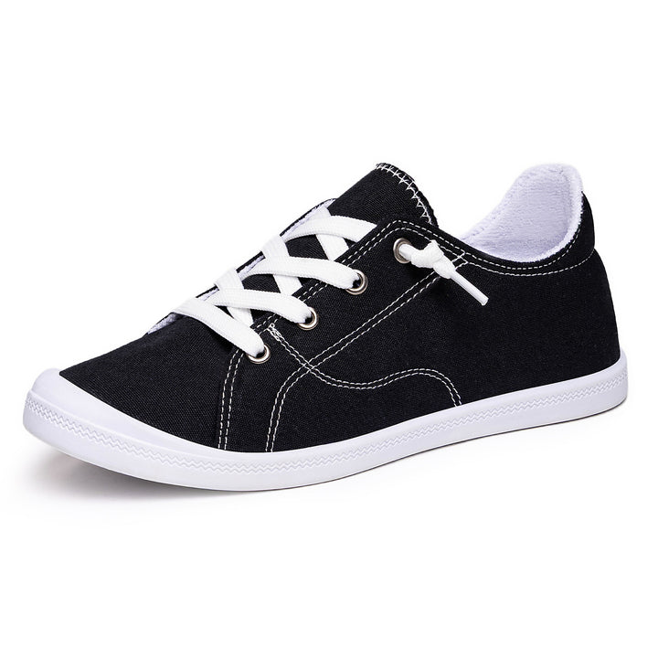 Women’s classic canvas low-top sneakers with reinforced rubber sole, metal eyelets, and padded heel collar Mune Fashion