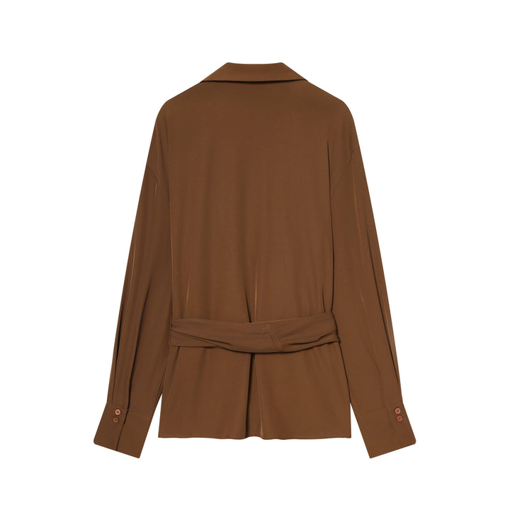 Women's flowing wrap blouse with wide lapel collar, dropped shoulder, and decorative side tie Mune Fashion