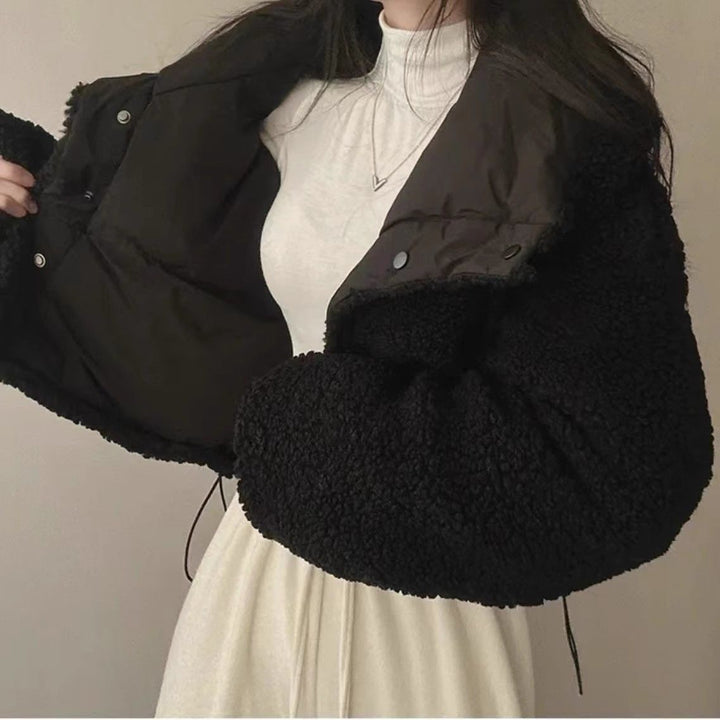 Women's short quilted puffer jacket with teddy collar, roll-up sleeves, and drawstring hem Mune Fashion