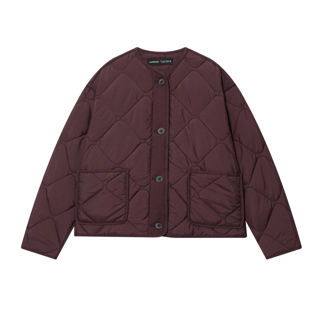 Women's diamond quilted cardigan jacket with round neckline and patch pockets Mune Fashion