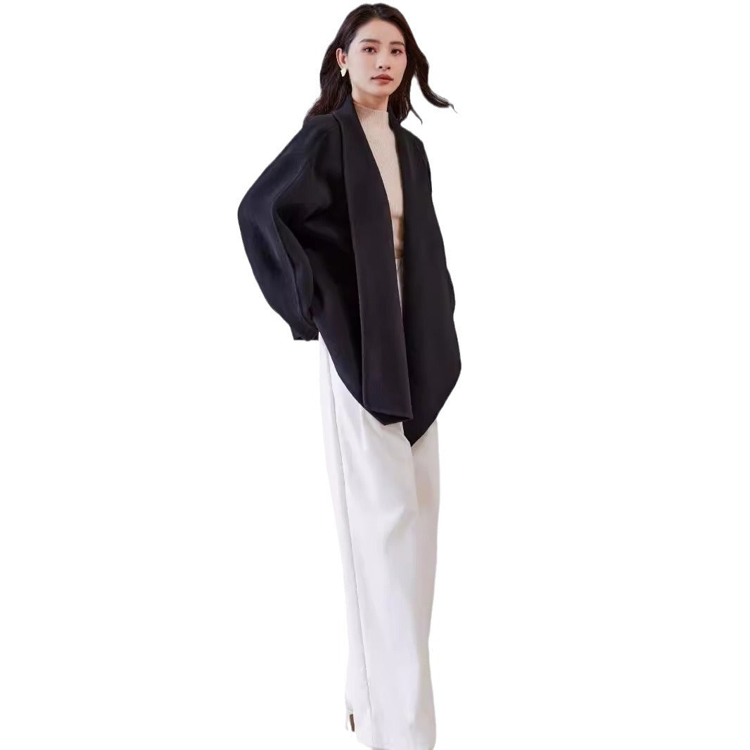 Women's oversized coat made from wool blend with open shawl collar and asymmetrical hem Mune Fashion